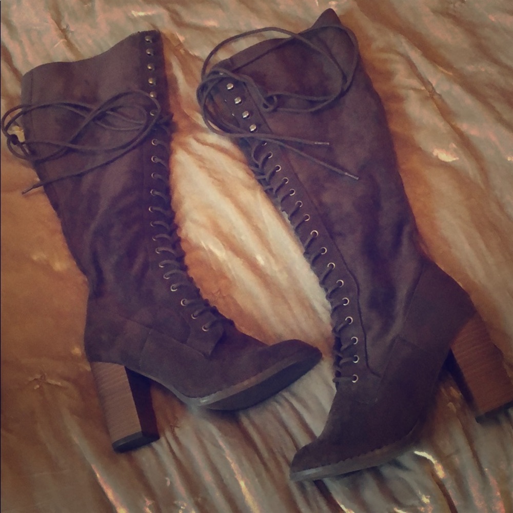 Knee high lace up boots with chunky heel